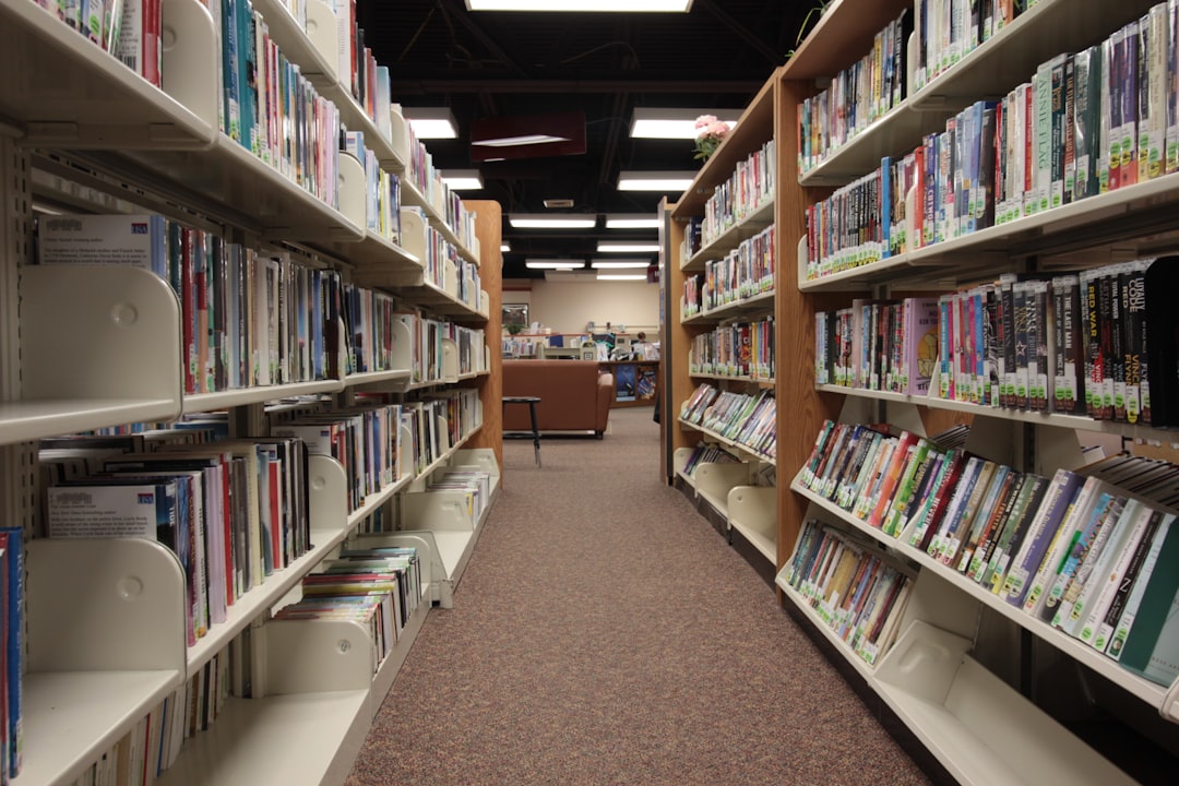 A view between library shelves of books at the Marshall Public Library in Pocatello, Idaho.